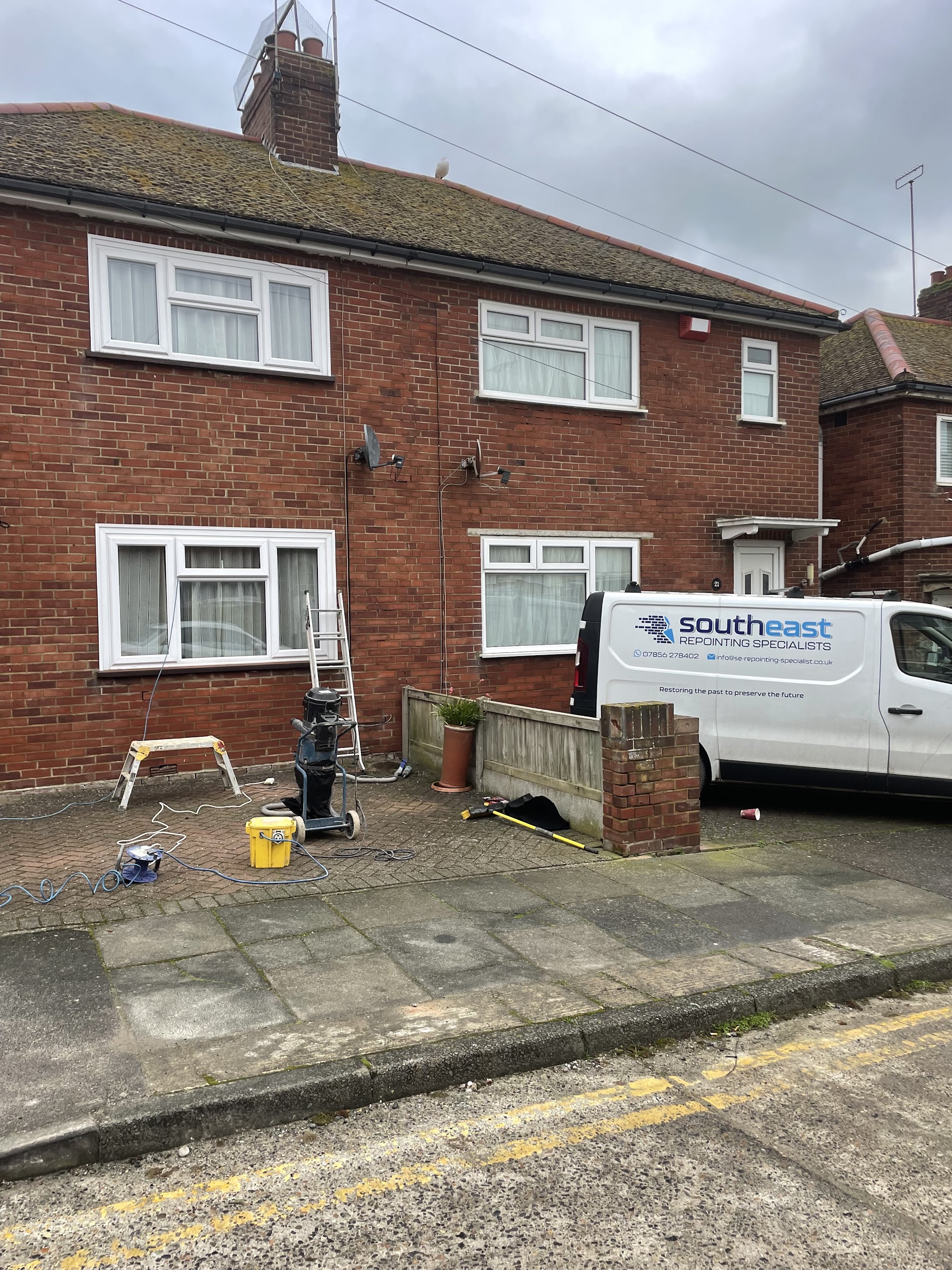 Our van on site outside a semi-detached house